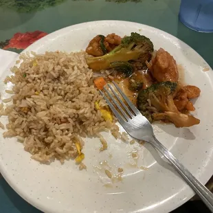 Broccoli chicken and fried rice.