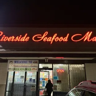 a woman walking out of the door