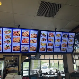 menus on the wall of the restaurant