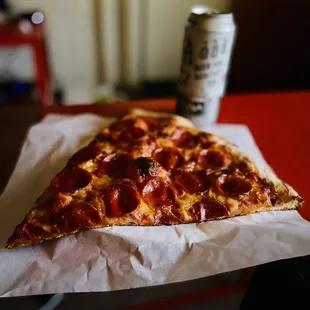 Big slice of Pepperoni. Beer for scale.