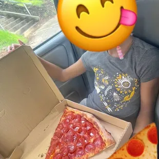 My baby with her pizza