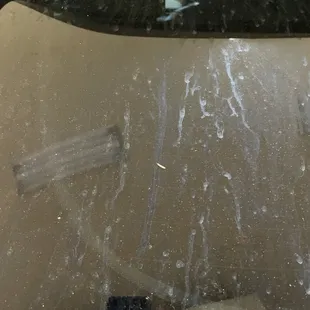 Driver's side window.