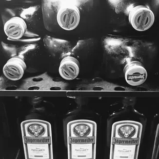 a black and white photo of a vending machine