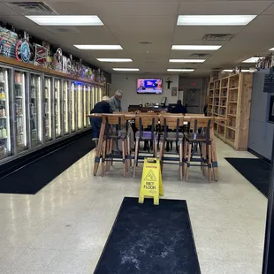 a wet floor in a grocery store