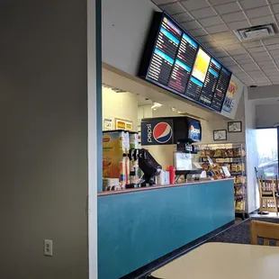 Interior of restaurant, nothing fancy, could use a bit of updating.