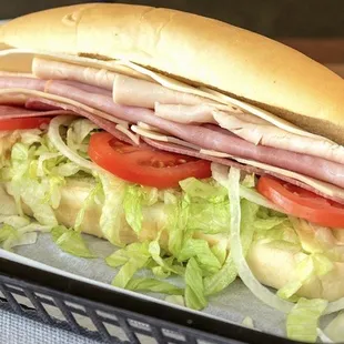 a sub sandwich in a basket
