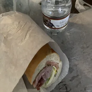 Italian sandwich with mayo mustard lettuce tomato and extra pickles
