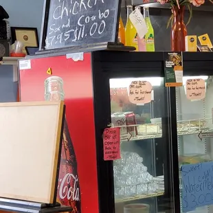 a refrigerator with a sign on it