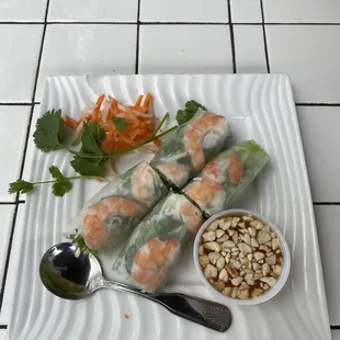 a plate of food with shrimp and vegetables