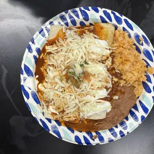 Enchilada plate with rice and beans ($11.99 USD)