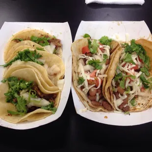 Three regular carnitas tacos and two super carnitas  tacos.