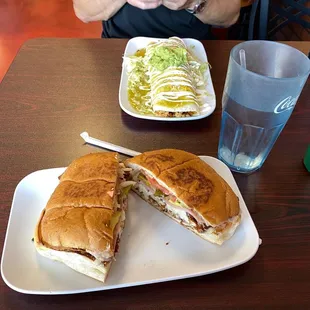 Burrito de al pastor and a torta suprema