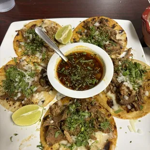Birria tacos with queso