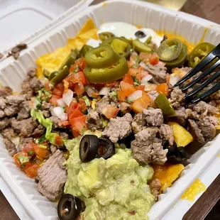 Super Nachos....sorry the sparkling wine is not included!