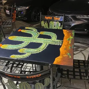 Updated outdoor dining, cute tables. Indoor decor updated, too.