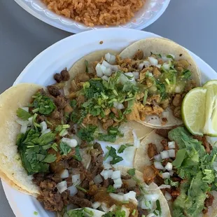 Tacos, rice, beans, and chips