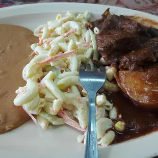 Barbacoa acompañada con tortillas hechas a mano