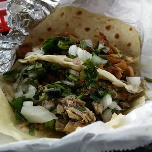 Chicken and carnitas taco. Not bad.