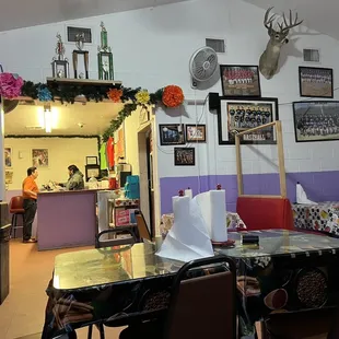 Dining area with baseball pics and trophy mount