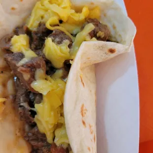 Yummy Carne guisada with cheese taco