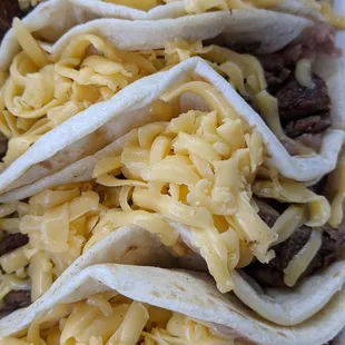Taco morales: beef fajita, beans and yellow cheese