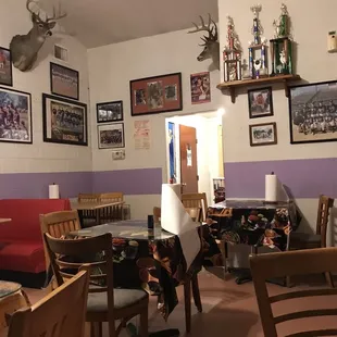 Dining area with local pictures.