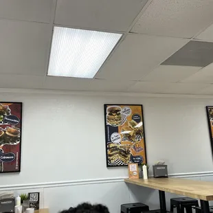 a dining area with tables and chairs