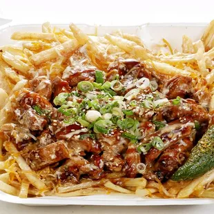 New menu is here!  Chicken Teriyaki Fries. This includes fries, cheese, house dressing, teriyaki chicken or beef, onion and sesame on top.