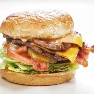Our delicious and tender, Double Cheese Burger,adding bacon. Don&apos;t miss it!