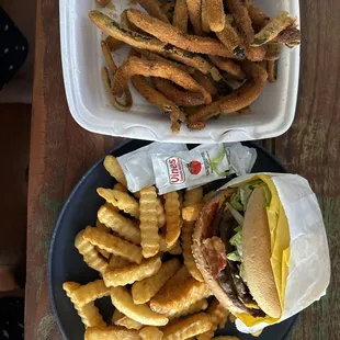 Double bacon, burger with fries and a side order of fried zucchini yes I'm sharing it with someone don't come at me. So delicious.