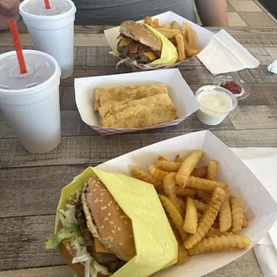 Double bacon cheeseburger combo, two fried burritos, and a cheeseburger combo. Ordered ranch.