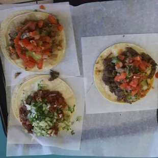 (from top l.) carnitas, carne asada, pastor