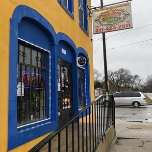 a blue and yellow building