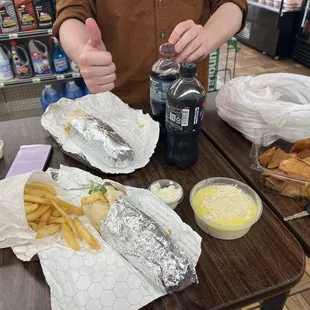 The spread! Chicken shouk sandwiches, fries, pita chips, and baba ganoush.