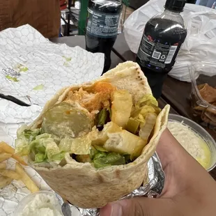 Inside of the chicken + garlic sandwich. Huge chunks of garlicky chicken, pickles, lettuce, and fries--and I added jalapeños!