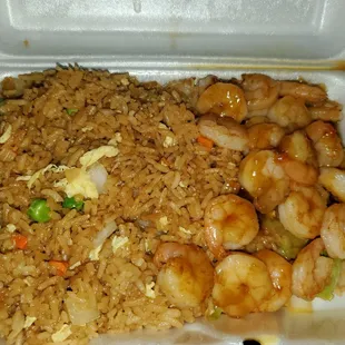 a tray of fried rice and shrimp