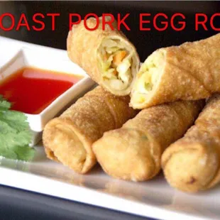 a plate of fried egg rolls