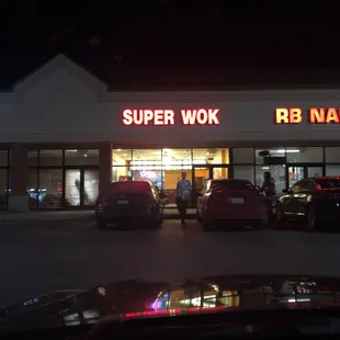 cars parked in front of the store