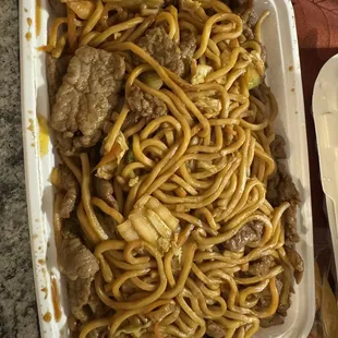 beef and noodles in a styrofoam container