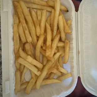 french fries in a styrofoam container