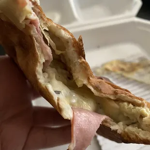 Calzone with white sauce, Canadian bacon + artichokes. Ranch on the side.