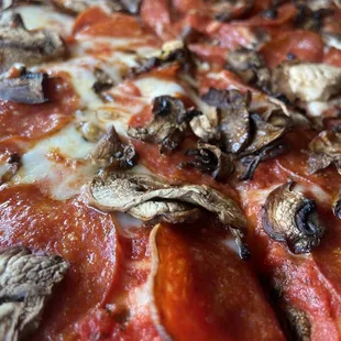 pepperoni, mushrooms, and cheese