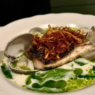 Baja Striped Bass | manila clams, hearth roasted leeks, crispy shallots