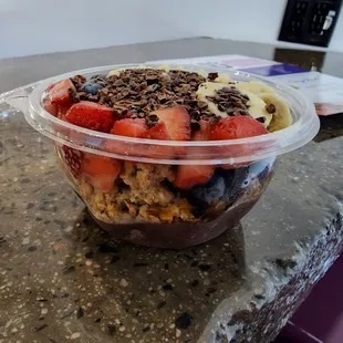 a bowl of fruit and yogurt