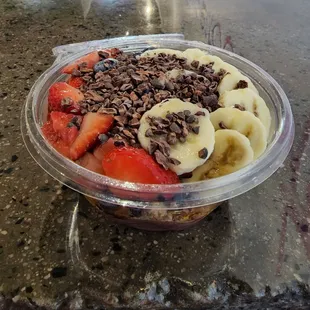 Magic Dragon with an Acai base added banana and Caramel drizzle.  Slicks child and refreshing on a hot day.