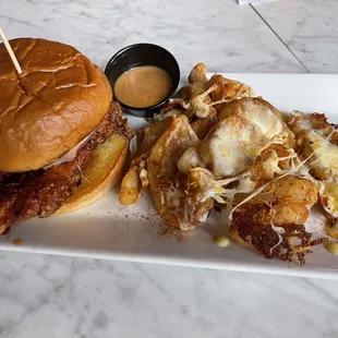 Fried chicken sandwich and truffle Parmesan fries.