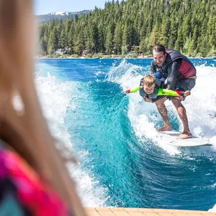 Fly-surfing! Check out the G25&apos;s clean wave for two surfers.  Love Rip Curl wetsuits.  Yeah Tahoe Surf Company!  Photo by Alex Baker.
