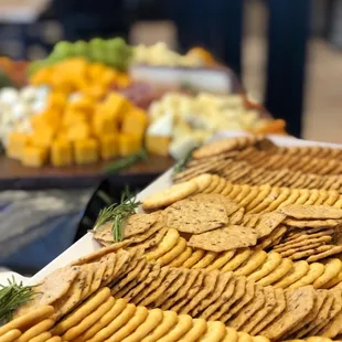 Variety of crackers cheese and wine