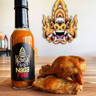 NāGA Fire hot sauce is a lemony, sweet, flavorful hot sauce made with Thai Chili peppers  Great on wings, steak, eggs, fish and more!