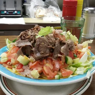 a bowl of salad on a table